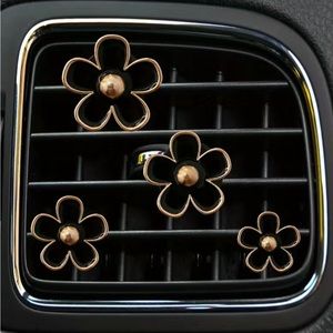 Cute air freshener car decor.  Just clip on your vents.